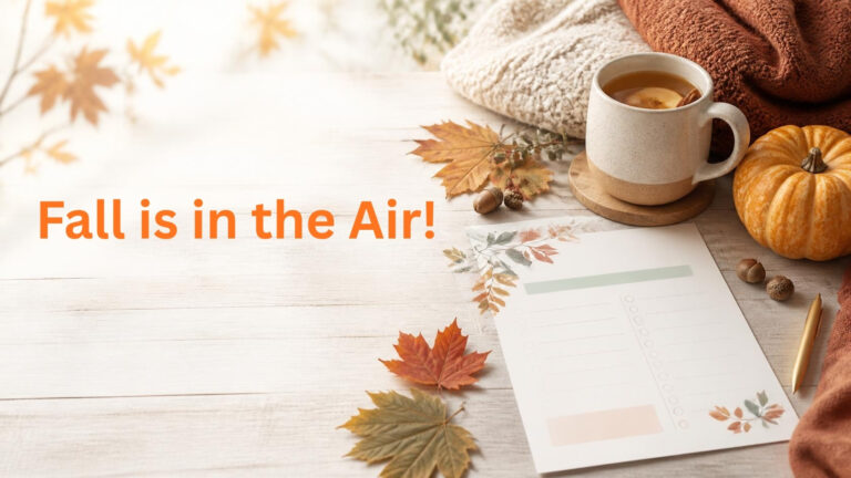 Fall is in the air. Photo of hot apple cider, leaves and a small pumpkin